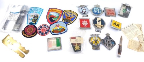 A group of motor racing badges, comprising San Francisco Police, Fire Inspection, Surrey Fire Brigade Drill Section, a Ford domestic bezel part, various fire and rescue badges, a Rover car badge, etc. (a quantity)