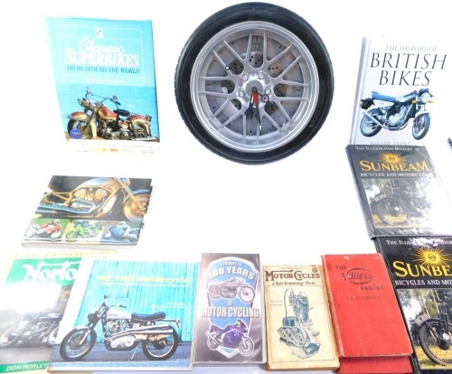 Automobile trinkets and accessories, a car tyre wall clock, 34cm diameter, two Villiers Engine books, a Motorcycle and How to Manage Them 18th Edition Guide, Tribute to 100 Years of Motorcycling Video, My Cool Motorcycle guide, Classic Motorcycles Norton