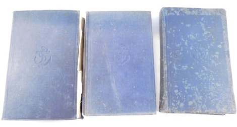 Three volumes of the Admiralty and Navigation Manual, volumes 1-3 dated 1938, in blue bindings.