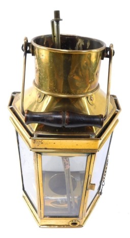 A Bullpit and Sons Limited of Birmingham flat backed carriage lantern, with swing handle, 42cm high.