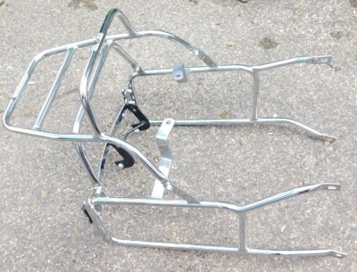 A stainless steel pannier rack, to fit a Triumph Bonneville T100.