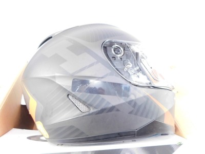 A HJC motorcycle helmet, boxed, with carry bag and gloves. - 3