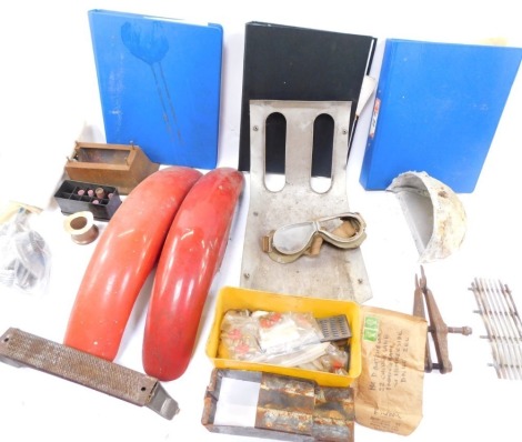A group of motorcycle parts, to include mud guards, goggles, etc. (1 box)