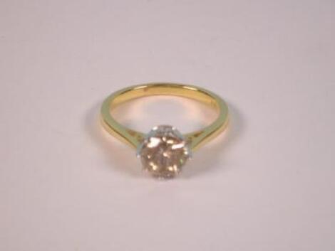 A solitaire diamond ring of approx. 1ct (heavily included) to 18ct