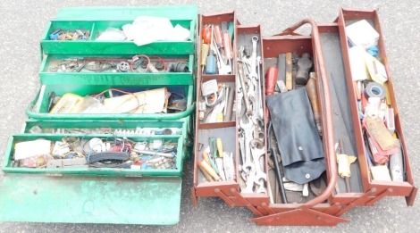 Two cantilever metal tool chests and contents, comprising a red Robuck tool chest, with miniature screwdrivers, spanners, and brushes, and a green cantilever tool chest, with electrical parts, bulbs, etc. (2 boxes)