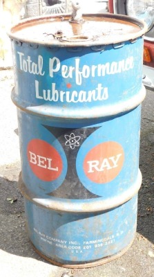 A Belray Total Performance Lubricant oil drum, 67cm high, 38cm diameter.