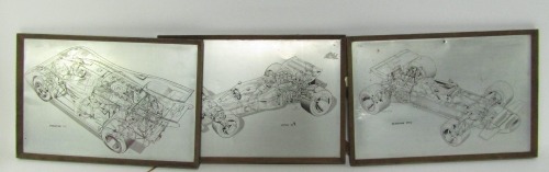 Three metal automobilia pictures, comprising Lotus 72, Porsche 917 and a Brabham BT33, each in wooden frame, 30cm x 45cm.