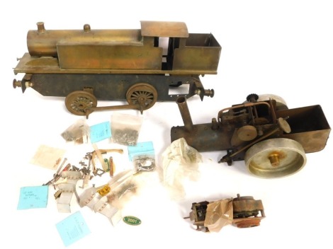 An incomplete 3½" gauge brass locomotive, and an incomplete steam tractor. (contents of one box)