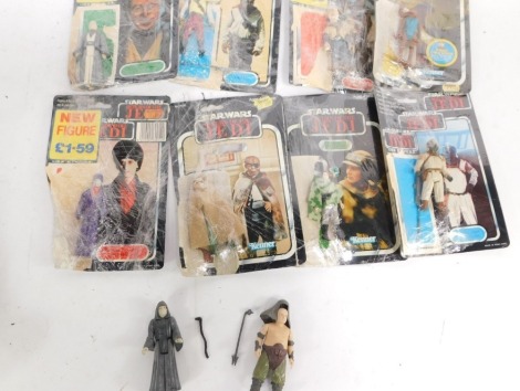 Various Star Wars Kenner Return Of The Jedi action figures, Klaatu in Skiff guard outfit, Rancor keeper, Prune Face, Emperor, Princess Leia with combat poncho, Anakin Skywalker, Imperial Dignitary, Yak Face, Barada and Hammer Head, with part card backings