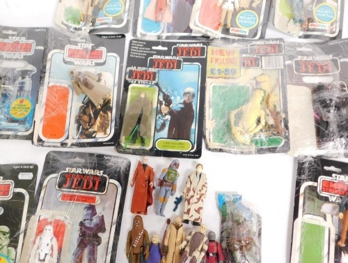 Various Star Wars Palitoy Empire Strikes Back figures, Luke Skywalker, Princess Leia in Bespin gown, Luke in Bespin fatigues, Tusken Raider, Dengar, Storm trooper, Hans Solo in Bespin outfit, FX-7, Boba Fett and Obi-Wan Kenobi, with part card backings. (a