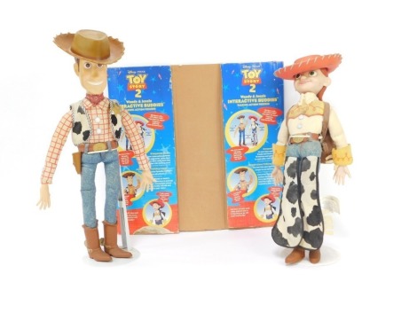 Disney Pixar Toy Story 2 Woody and Jessie interactive talking action figures. (2)