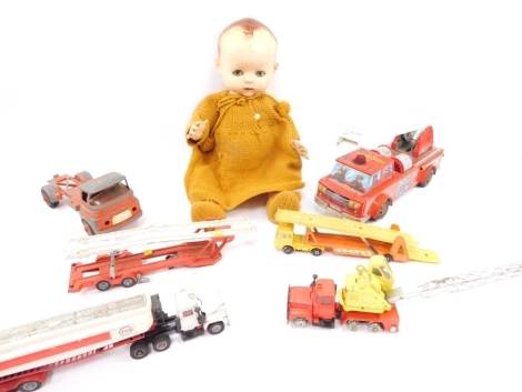 Play worn die cast vehicles, including Tri-ang, Spot On Models, Tony Bell ice cream van, tin plate fire engine, Corgi Major Mat truck, Dinky Toys Mercedes Benz LP 1920, Matchbox Super Kings, DAF car transporter and a Pedigree doll, etc. (a quantity)