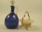 A 19thC Bristol blue type mallet shaped claret jug and stopper with clear twisted handle