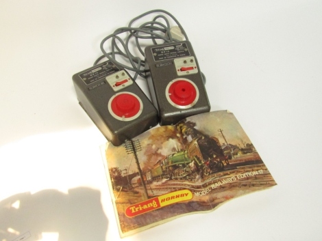 Two Tri-ang RP13 controllers, and a Tri-ang Hornby Edition 17 catalogue. (3)WARNING! This lot contains untested or unsafe electrical items.  It is supplied for scrap or re-conditioning only. TRADE ONLY 