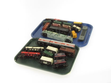 Hornby and Tri-ang OO gauge rolling stock, including ICI 357 tanker, Murgatroyds tanker, Insulfish wagon, Shell Lubricating Oil tankard, seven plank wagons, brake vans, etc. (2 trays)