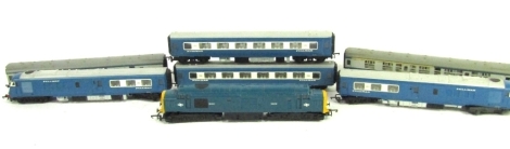 A Tri-ang OO gauge Pullman diesel multiple unit, two Pullman coaches, a Class 37 locomotive BR blue livery, and two Inter-City coaches. (7)