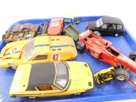 Corgi, Burago and other diecast vehicles, including a Ferrari Tessarossa, Ferarri F310B, Corgi Utterly Butterly Barn Stormers, Wing walking plane and various built model kits. (1 tray and boxed)