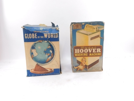 A Metoy Play Things metal hoover washing machine, and a Chad Valley educational globe of the world. (2)