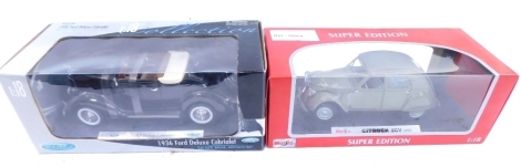 A Maisto 1:18 scale die cast super edition Citroen 2CV 1952, and a Welan 1:18 scale Ford Deluxe Cabriolet, boxed. (2)