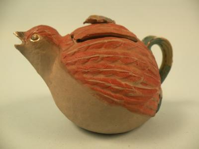 A small Japanese porcelain teapot in the form of a quail