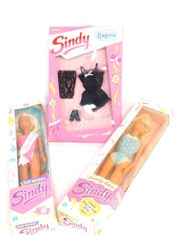 Sindy figures and outfits, to include a lingerie set, Sindy Top Model figure, and Lovely Lace, boxed. (3)