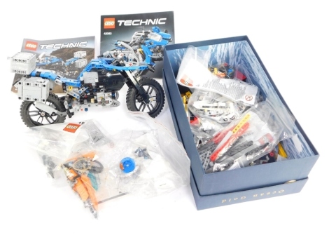 A Lego Technics BMW motorcycle, built and boxed, and a quantity of various loose Lego, instructions, etc. (a quantity)