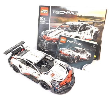 A Lego Technics Porsche 911, built, with instructions, boxed.