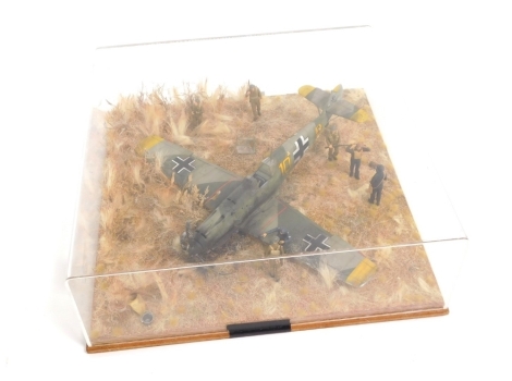 A cased diorama model of a crashed ME109E, in Battle of Britain 1940, 1:32 scale.