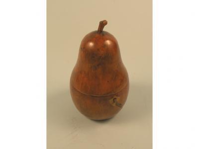 A turned wood tea caddy in the form of a pear