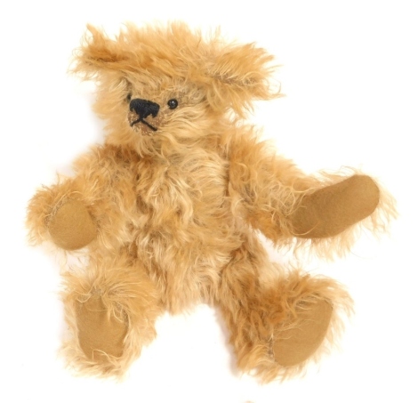 A Dorothy Short Studio 44 blonde plush jointed Teddy bear, 28cm high.