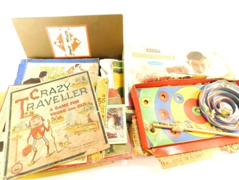 A vintage child's table tennis set, partially boxed, vintage games, Crazy Traveller, chemistry set, etc, (AF). (a quantity)