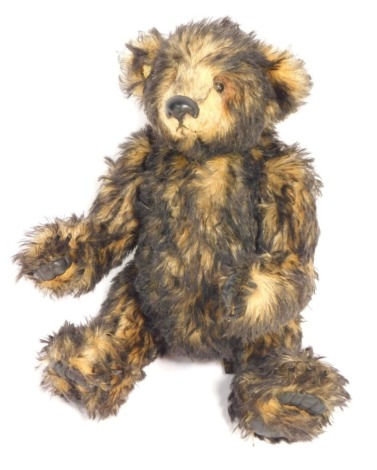 A Maray blonde and black plush jointed Teddy bear, with growl action and hump back, 30cm high.