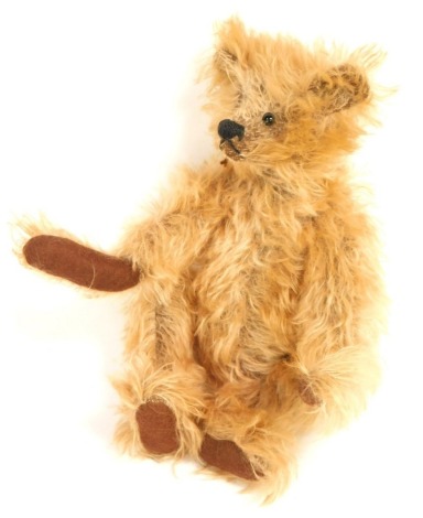 A Dorothy Short blonde plush jointed Teddy bear, with brown felt pads, black eyes and nose, 28cm high.