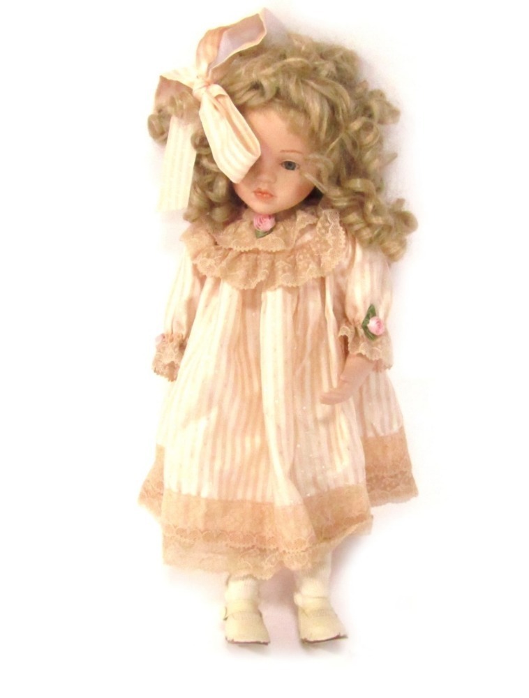 An SFK-32 bisque headed doll, standing pose with fixed and