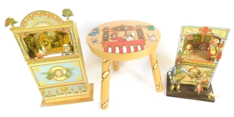 A Punch & Judy decorative stool and a cardboard Clarke Strand, Reproduction Punch & Judy puppet set, in made condition, and another similar (3)