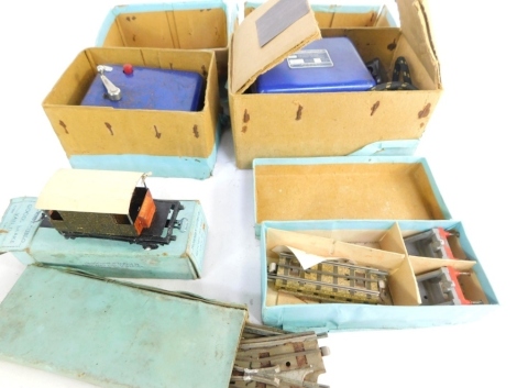 A group of Hornby Dublo OO gauge tin plate accessories, rolling stock, track, petrol tank wagon Power Ethyl, brake van D, oil tank wagon Royal Daylight, another, signals, corridor coach D1, etc., mainly boxed. (a quantity)