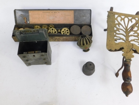 A metal money box formed as a chest of drawers, lacking key, a small quantity of coins, Mechanics Made Easy tin, marked Latelliott Hornby, other metal ware, trivet, etc. (a quantity)