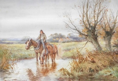 Henry John Sylvester Stannard RBA FRSA (British, 1870-1951). Two horses being led through a brook, in a country landscape, watercolour, signed, 24cm x 34cm.