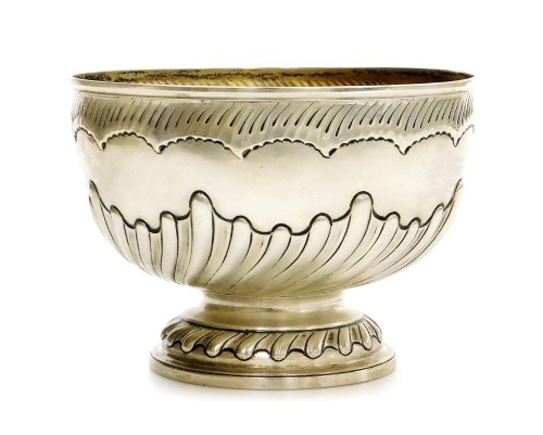 A Victorian silver fruit bowl, of semi spiral fluted and fruited form, makers name worn, London 1895, 20.5cm wide, 18½oz.