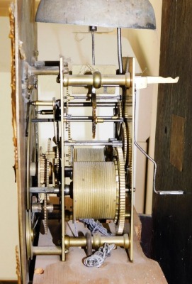 A George III mahogany longcase clock by Joseph Wood of Scarborough, the arched dial with foliate spandrels, silver chapter ring bearing Roman and Arabic numerals, subsidiary seconds dial and date aperture, eight day four pillar movement with bell strike, - 4