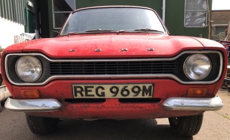 A barn/garage find Ford Escort Sport 1300, Registration REG 969M, first registered 14th May 1974, odometer reading of 75,680 miles, last tax disc for 2003, no paperwork, the instructing solicitor/executor has requested a replacement V5 which will be sent 