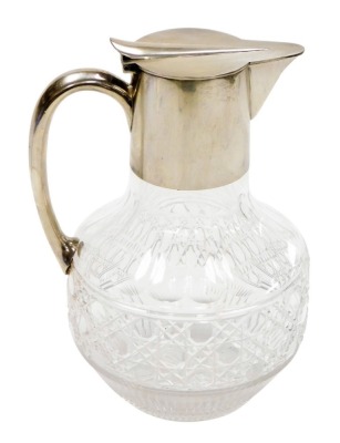 A Victorian cut glass claret jug, with silver mounted handle and hinged lid, Horace Woodward & Company Limited, London 1893, 19.5cm high.