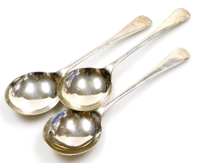 Three Edward VIII silver Old English pattern soup spoons, of plain form, Birmingham 1936, 6½oz.