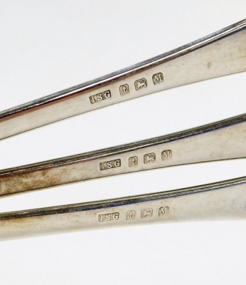 Three Edward VIII silver Old English pattern soup spoons, of plain form, Birmingham 1936, 6½oz. - 2