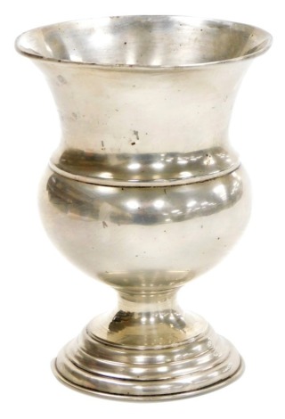 A George V silver goblet, with flared rim and bulbous body, on a stepped base, London 1925, 6¼oz, 14cm high.