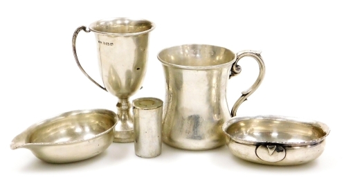 A group of small silver and white metal, to include a George V small cup, of hourglass form with scroll cast handle, engraved Teddy to body, Birmingham 1911, 6cm high, ladle bowls lacking handles, etc, weighable silver 4¼oz.