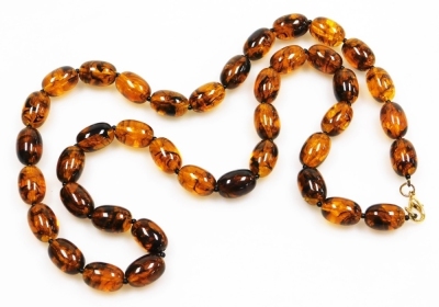 A string of graduated amber beads, with plated lobster claw clasp, forty beads, 114.5g all in.