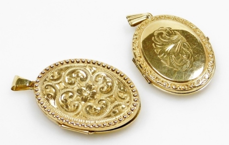 Two 9ct gold oval photo lockets, each with engraved decoration, from a link suspension, 12.4g all in.
