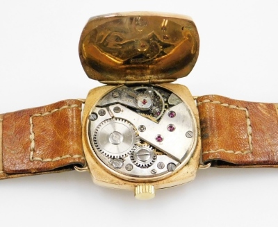 A mid century 9ct gold cased gentleman's wristwatch, circular white dial bearing Roman numerals, subsidiary seconds dial, in a square case, with leather strap. - 3