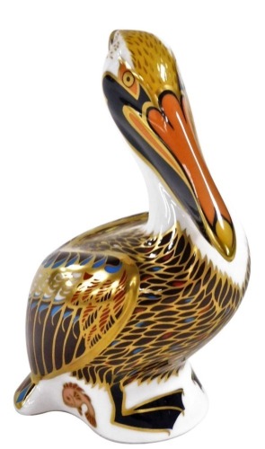 A Royal Crown Derby porcelain Imari paperweight, modelled as a Brown Pelican, circa 1998, gold stopper.